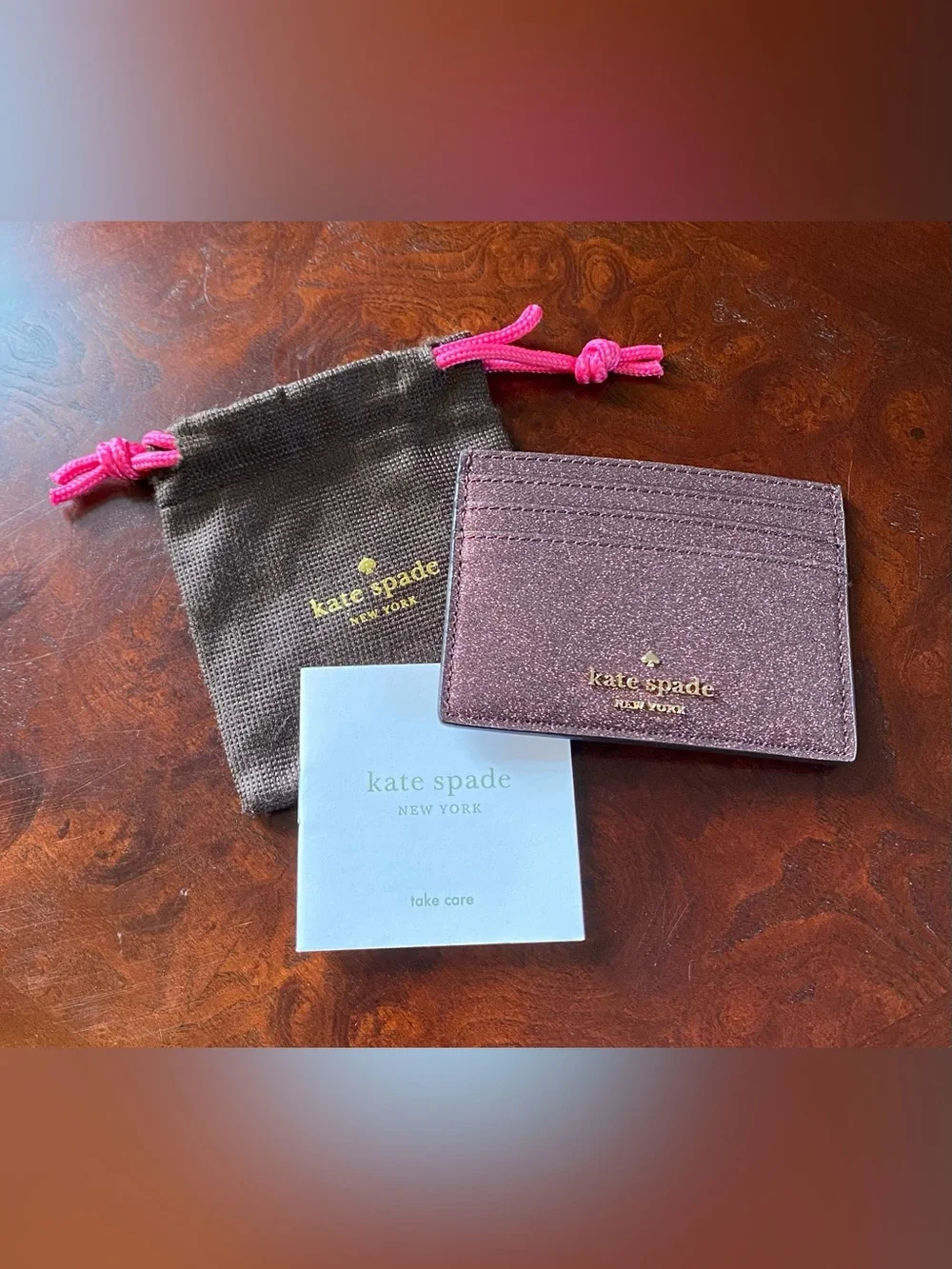 kate spade New York Pink Glitter Card Holder with Gold Logo